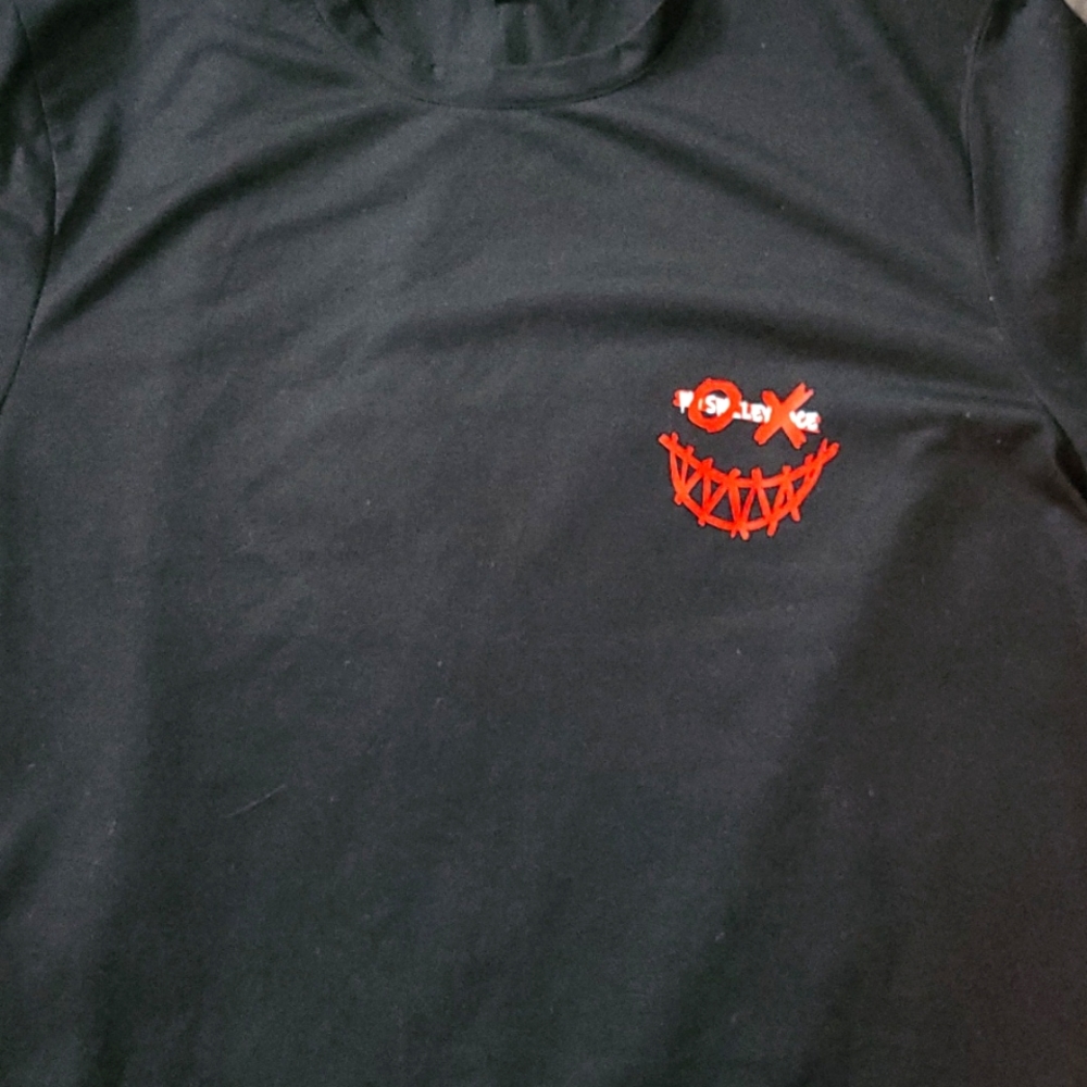 Large Black Shirt With A Red Smiley Face Print